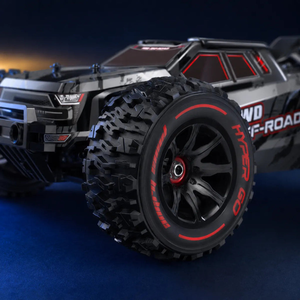 MJX Hyper Go 14210 — voiture RC tout-terrain 1/14 — gros plan de la carrosserie et des pneus — Gift Mello