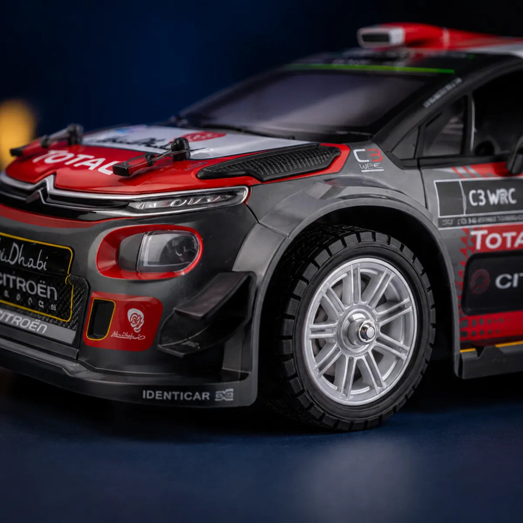 MJX Hyper Go 14303 — voiture RC rallye 1/14 — gros plan de la carrosserie et des pneus — Gift Mello