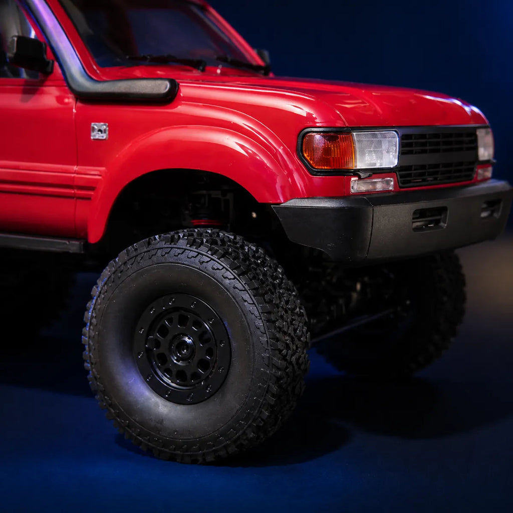 WPL C54 RTR — voiture RC crawler 1/16 — gros plan de la carrosserie et des pneus — Gift Mello